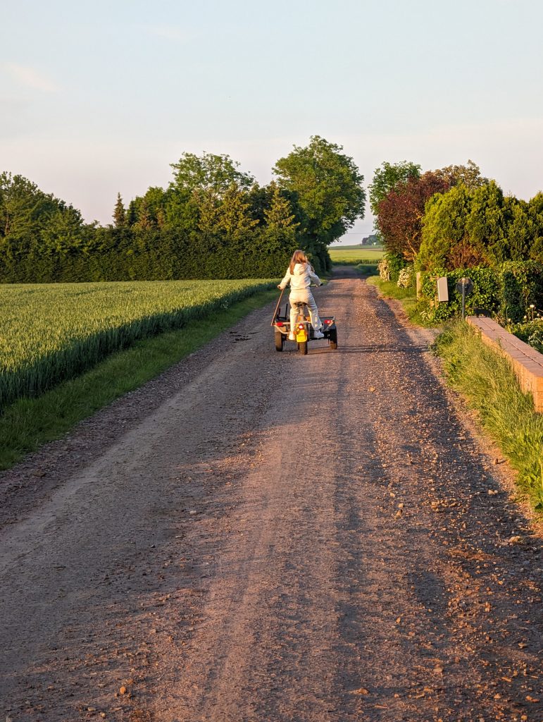 Moped on a gravel road.